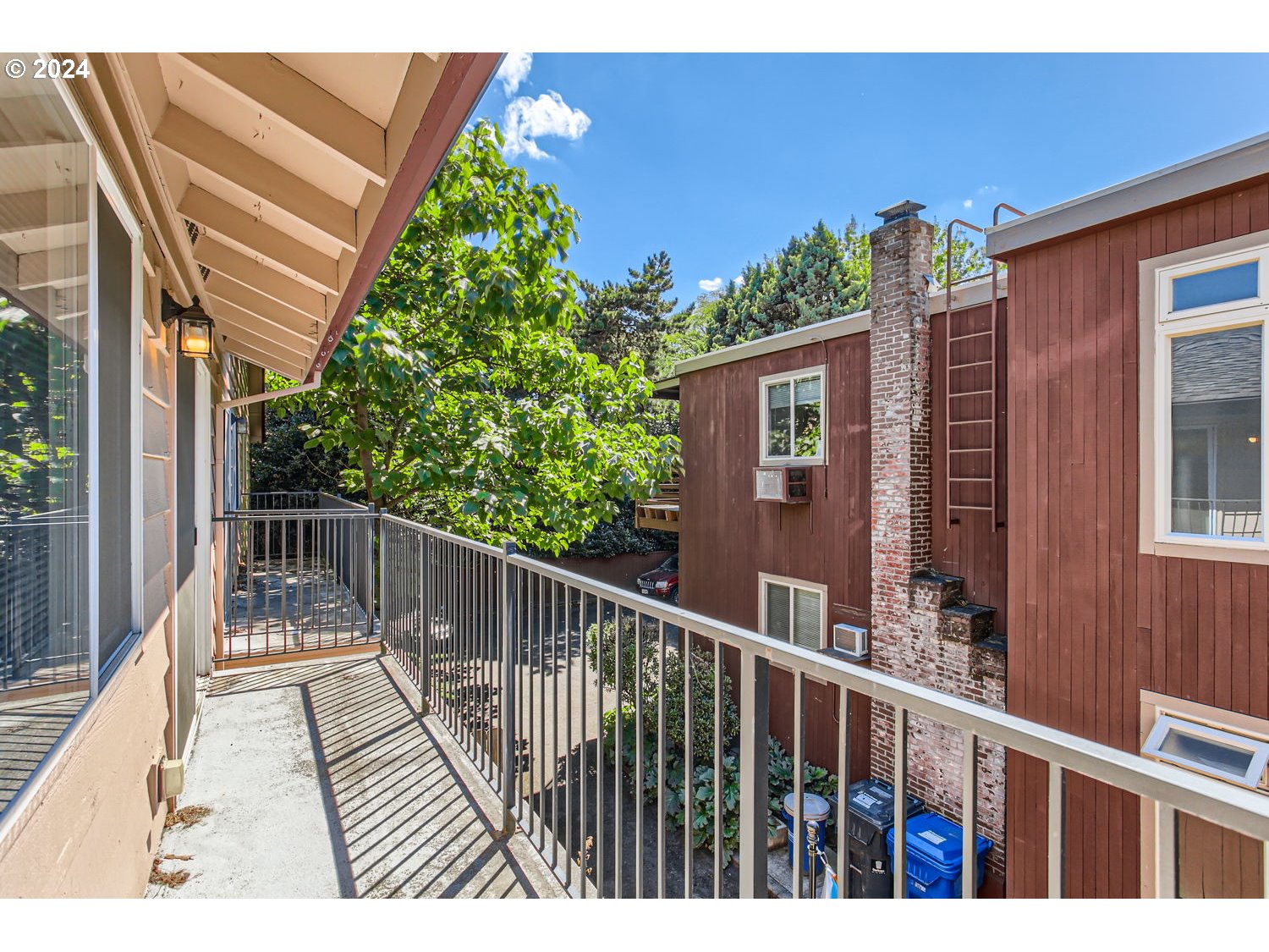 2022 Northeast Clackamas Street Portland, OR 97232 - Photo 12 of 13 a view of balcony with wooden floor
