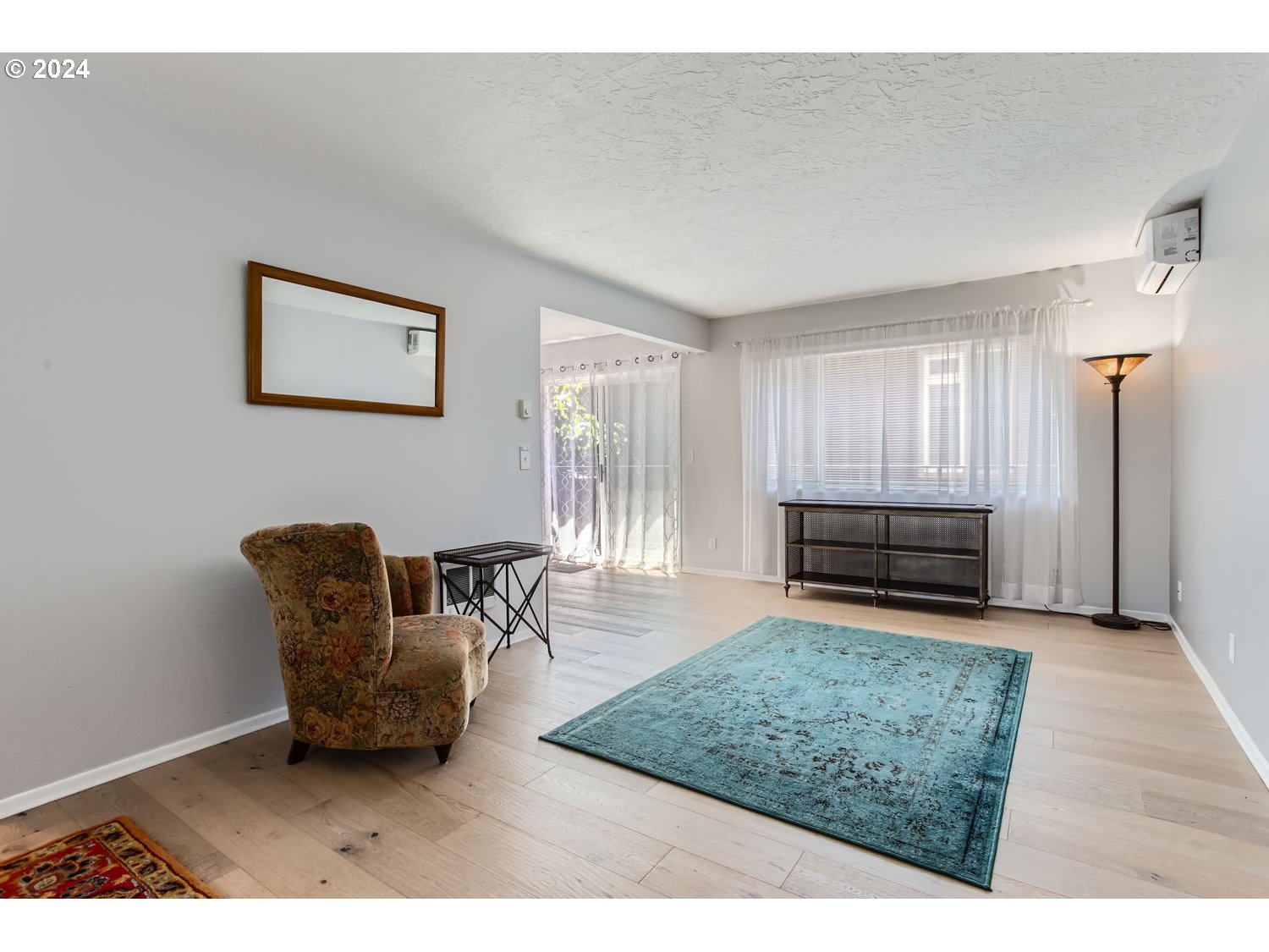 2022 Northeast Clackamas Street Portland, OR 97232 - Photo 3 of 13 a living room with furniture and a rug