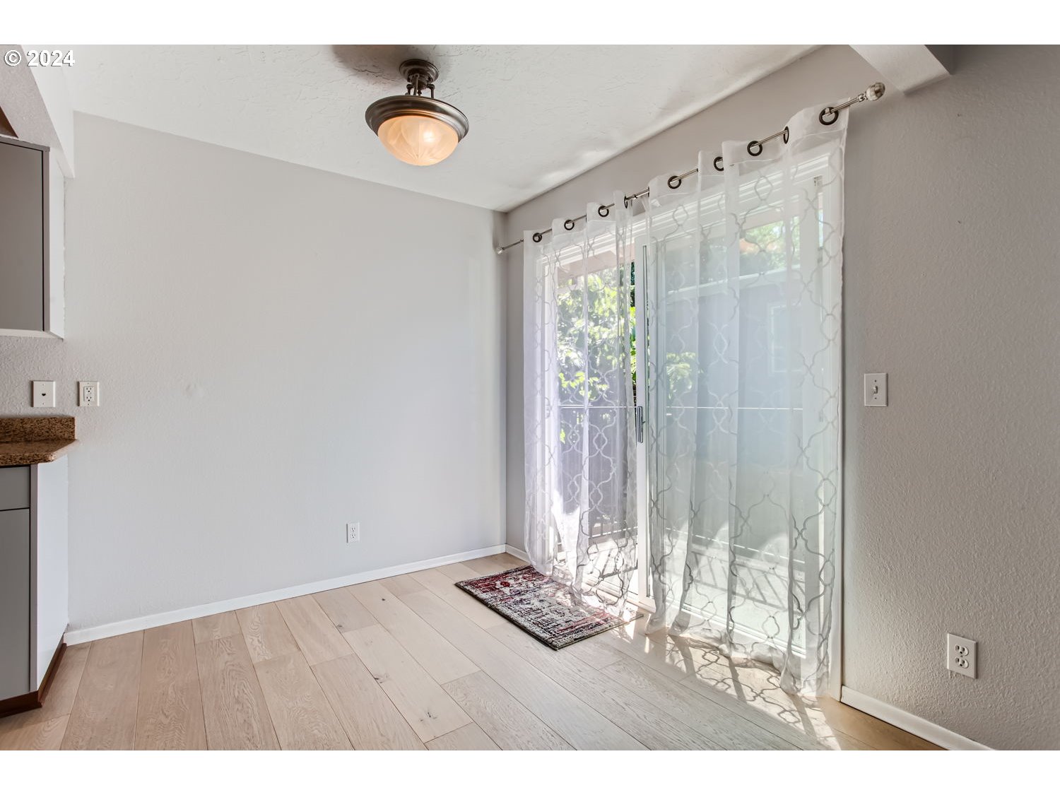 2022 Northeast Clackamas Street Portland, OR 97232 - Photo 5 of 13 a view of an entryway with wooden floor