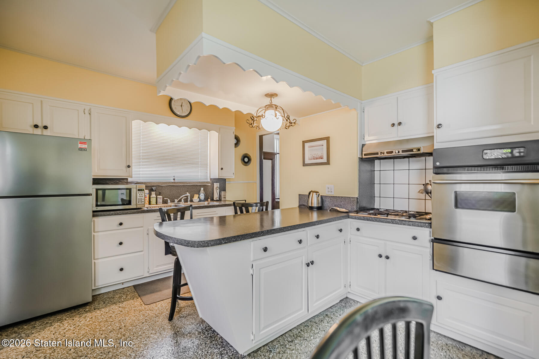 3 3rd Street Staten Island, NY 10306 - Photo 12 of 35 a kitchen with granite countertop a sink appliances cabinets and counter space