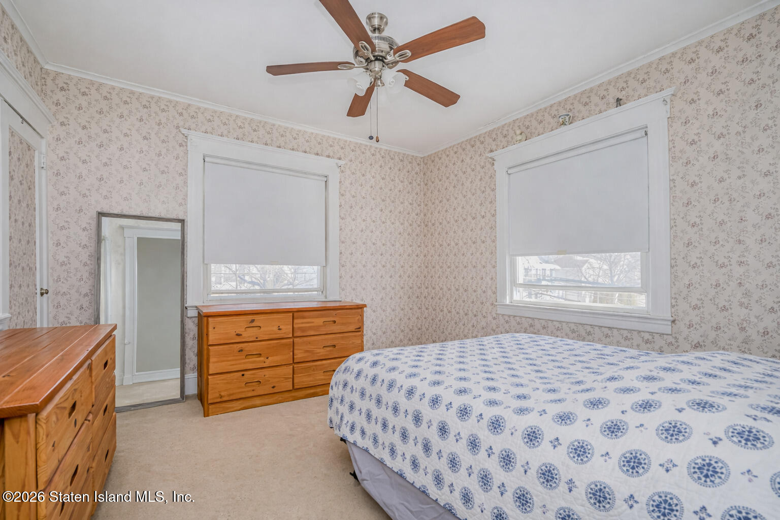 3 3rd Street Staten Island, NY 10306 - Photo 23 of 35 a bedroom with a bed and a dresser