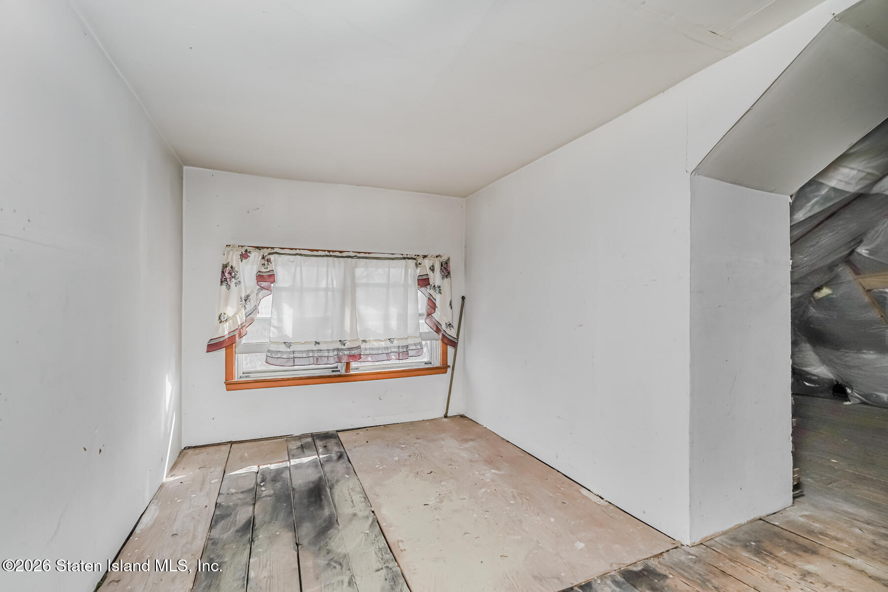 3 3rd Street Staten Island, NY 10306 - Photo 29 of 35 a view of room with window and hardwood