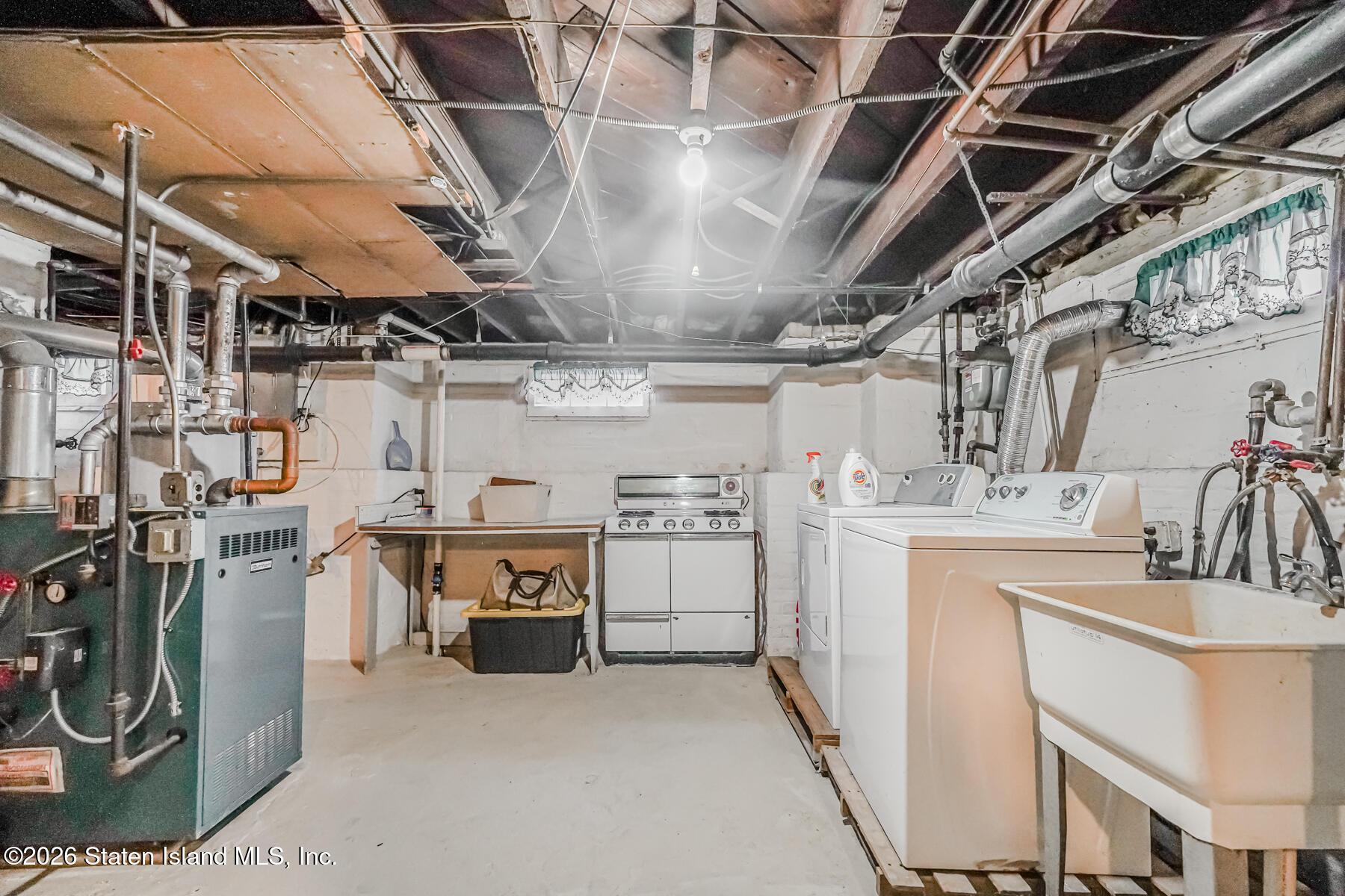 3 3rd Street Staten Island, NY 10306 - Photo 31 of 35 a utility room with dryer and washer