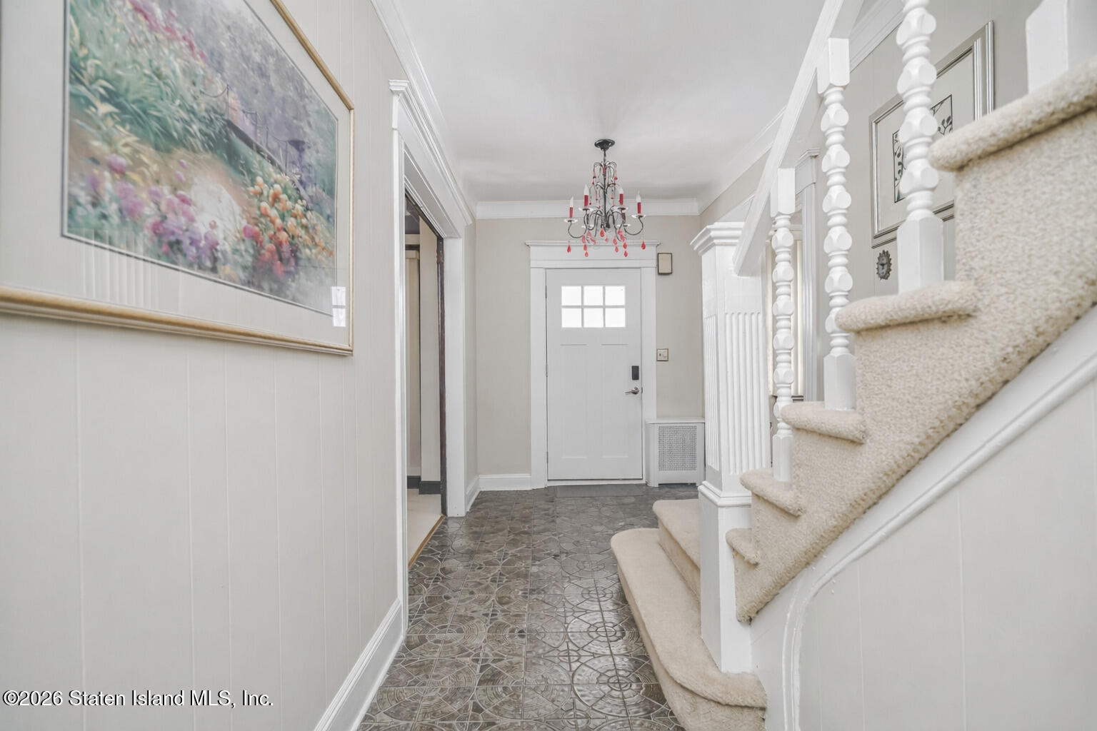 3 3rd Street Staten Island, NY 10306 - Photo 5 of 35 a living room with furniture and a chandelier