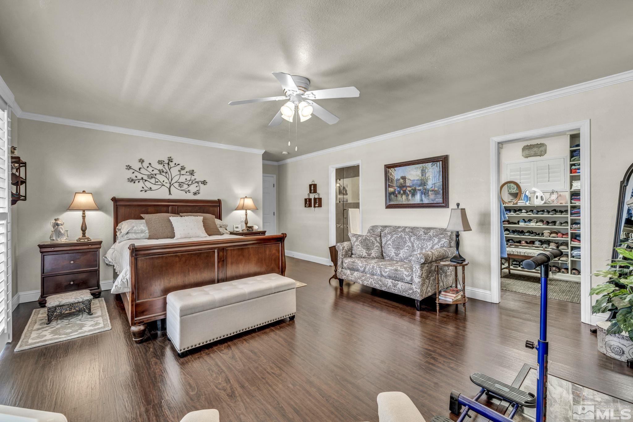 14435 Virginia Foothills Drive Reno, NV 89521 - Photo 19 of 40 a bedroom with furniture and wooden floor