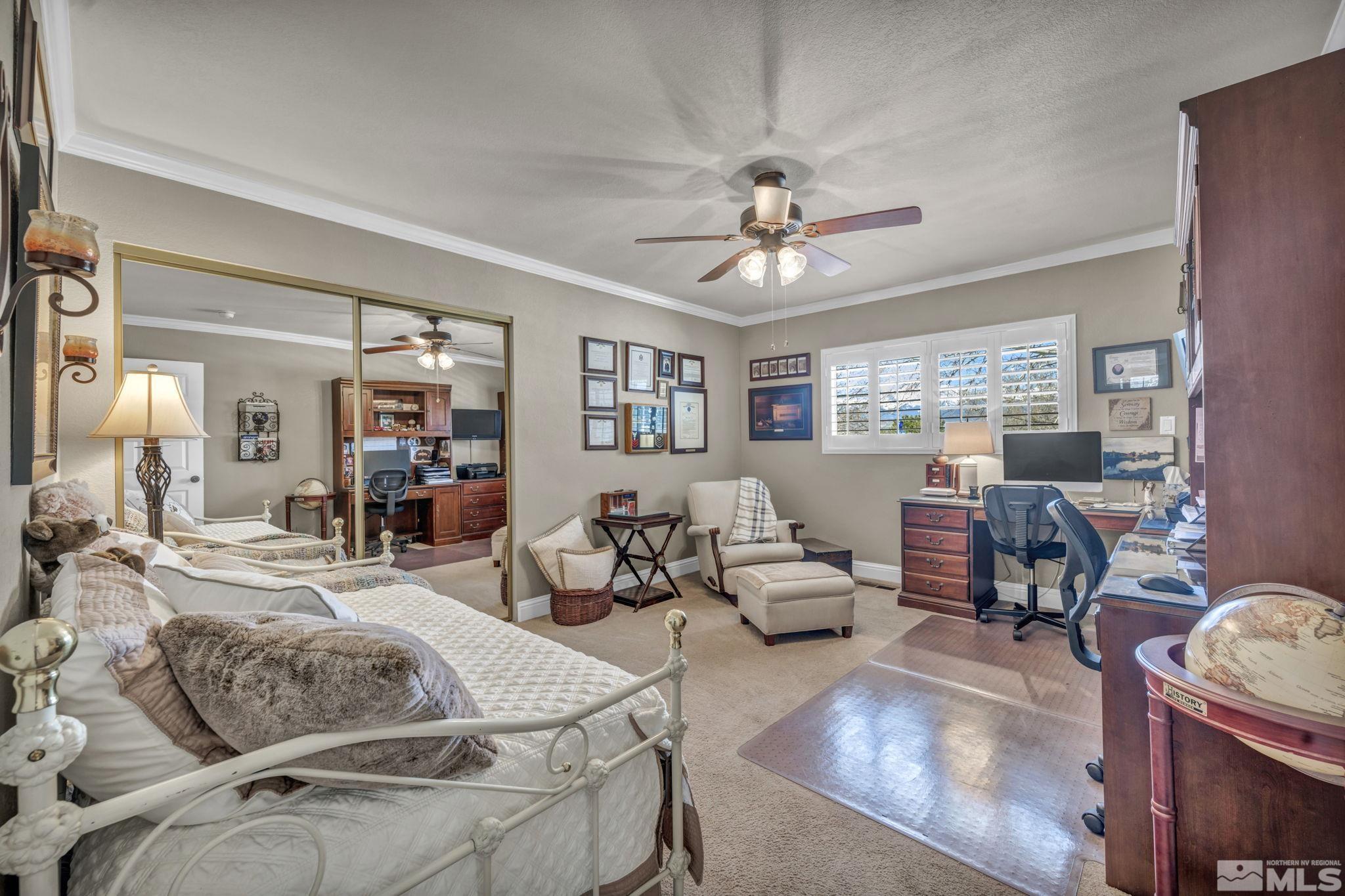 14435 Virginia Foothills Drive Reno, NV 89521 - Photo 25 of 40 a living room with furniture kitchen view and a window