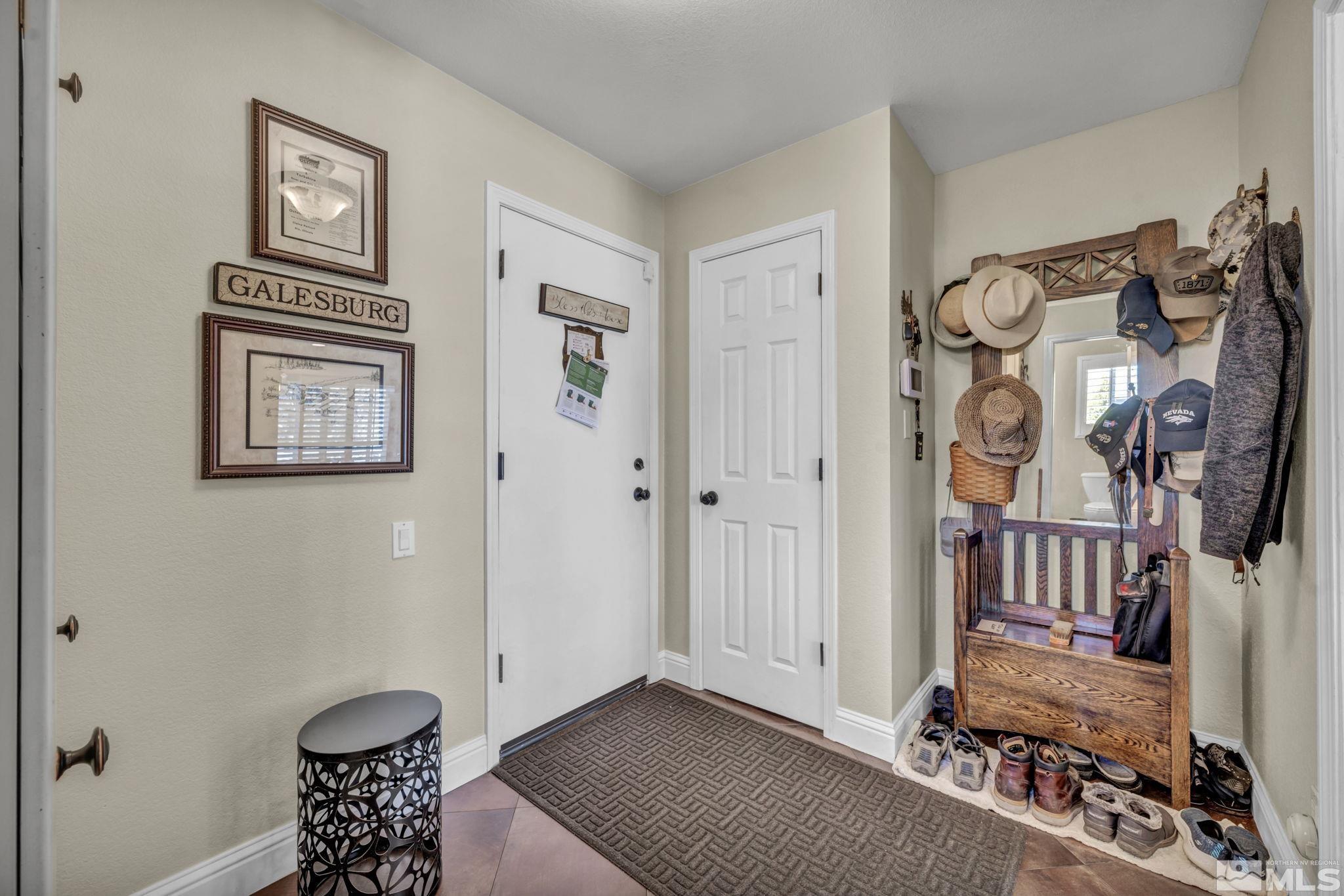 14435 Virginia Foothills Drive Reno, NV 89521 - Photo 26 of 40 a view of an entryway with wooden floor