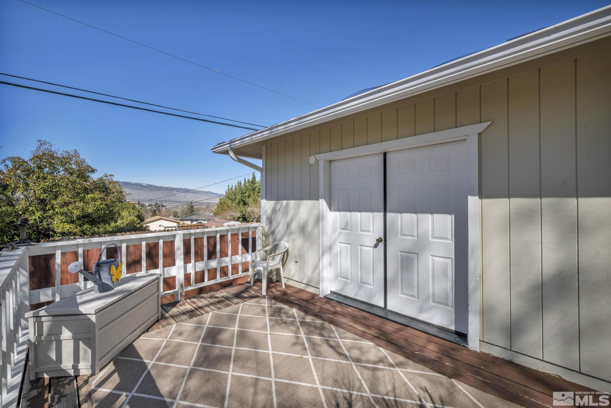 14435 Virginia Foothills Drive Reno, NV 89521 - Photo 35 of 40 a view of a balcony with wooden floor