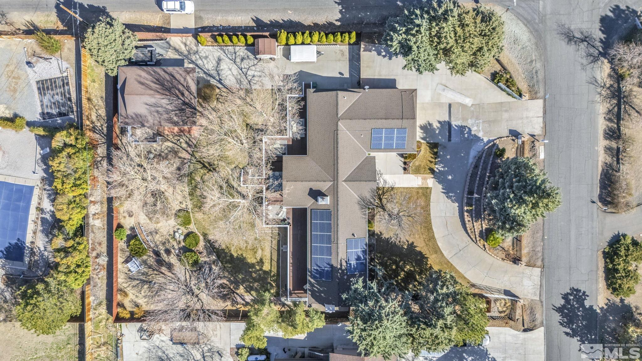 14435 Virginia Foothills Drive Reno, NV 89521 - Photo 5 of 40 an aerial view of a house with a yard and garden