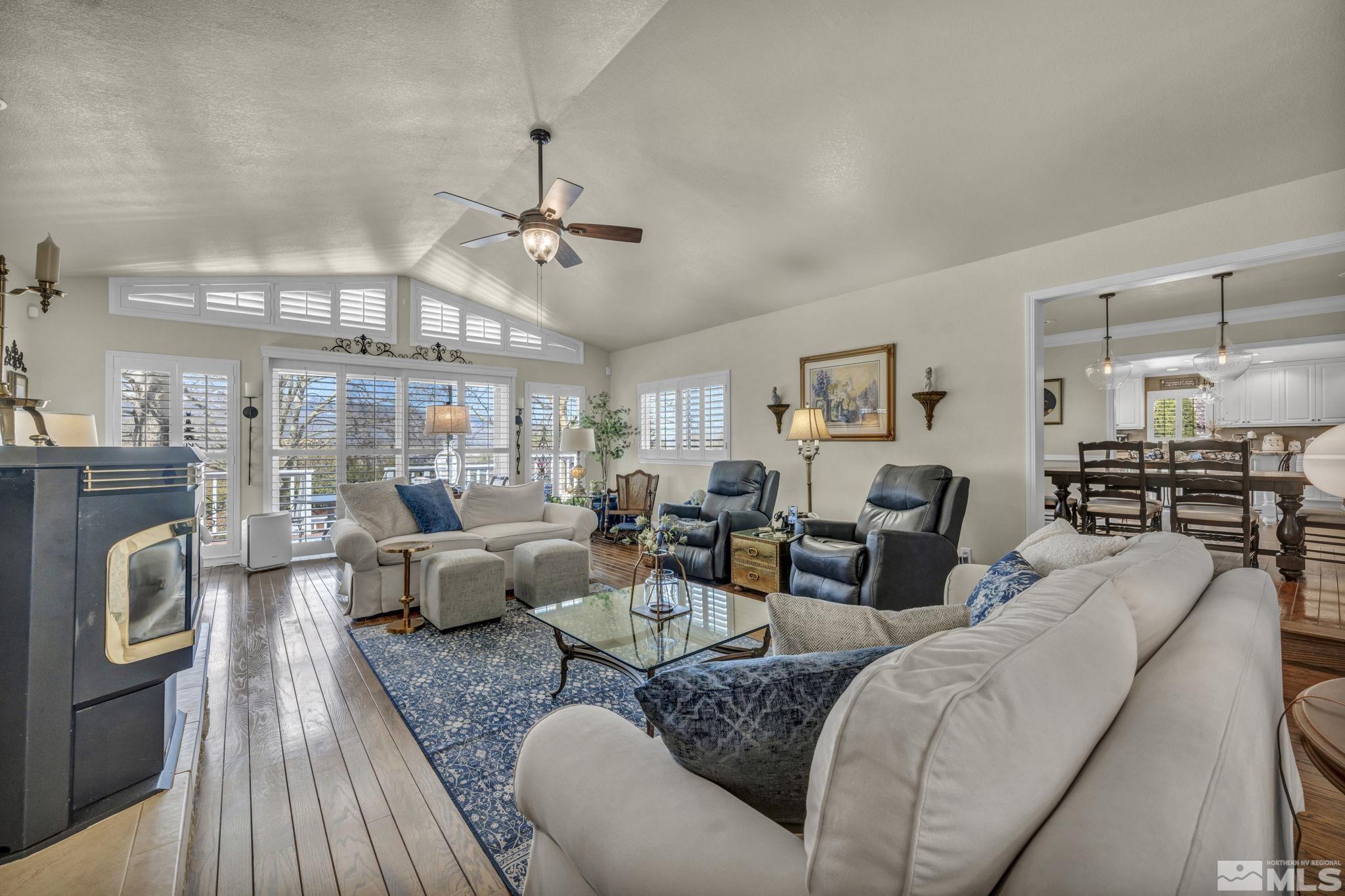 14435 Virginia Foothills Drive Reno, NV 89521 - Photo 10 of 40 a living room with furniture and a large window