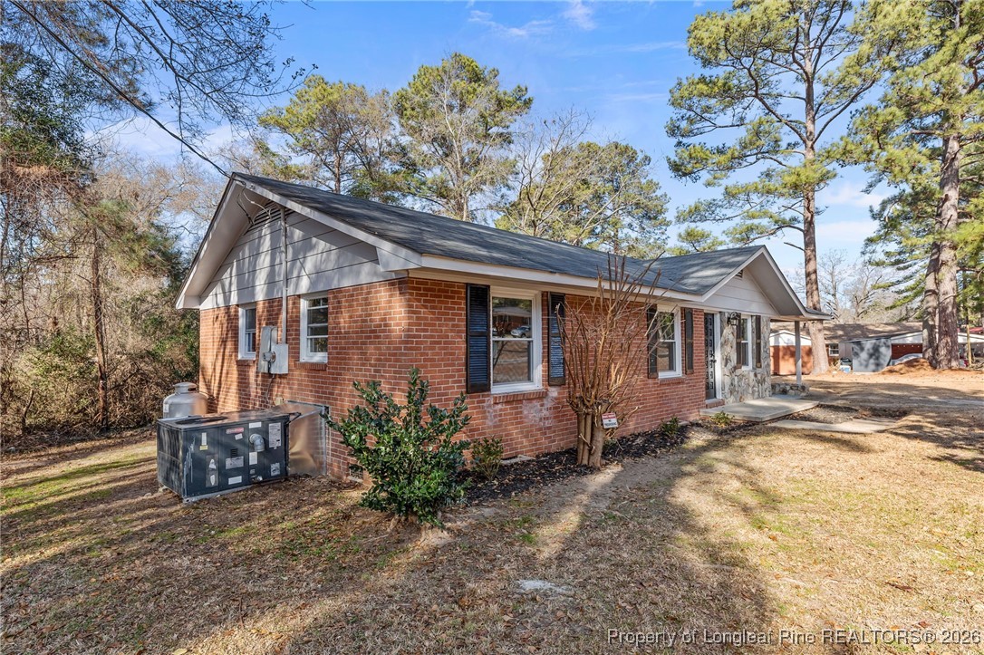 1509 Pope Street Raeford, NC 28376 - Photo 29 of 30 a view of a house with a yard