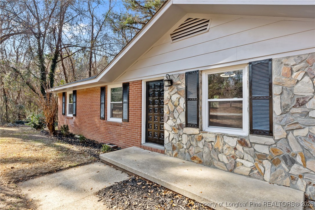 1509 Pope Street Raeford, NC 28376 - Photo 4 of 30 a front view of a house with a yard