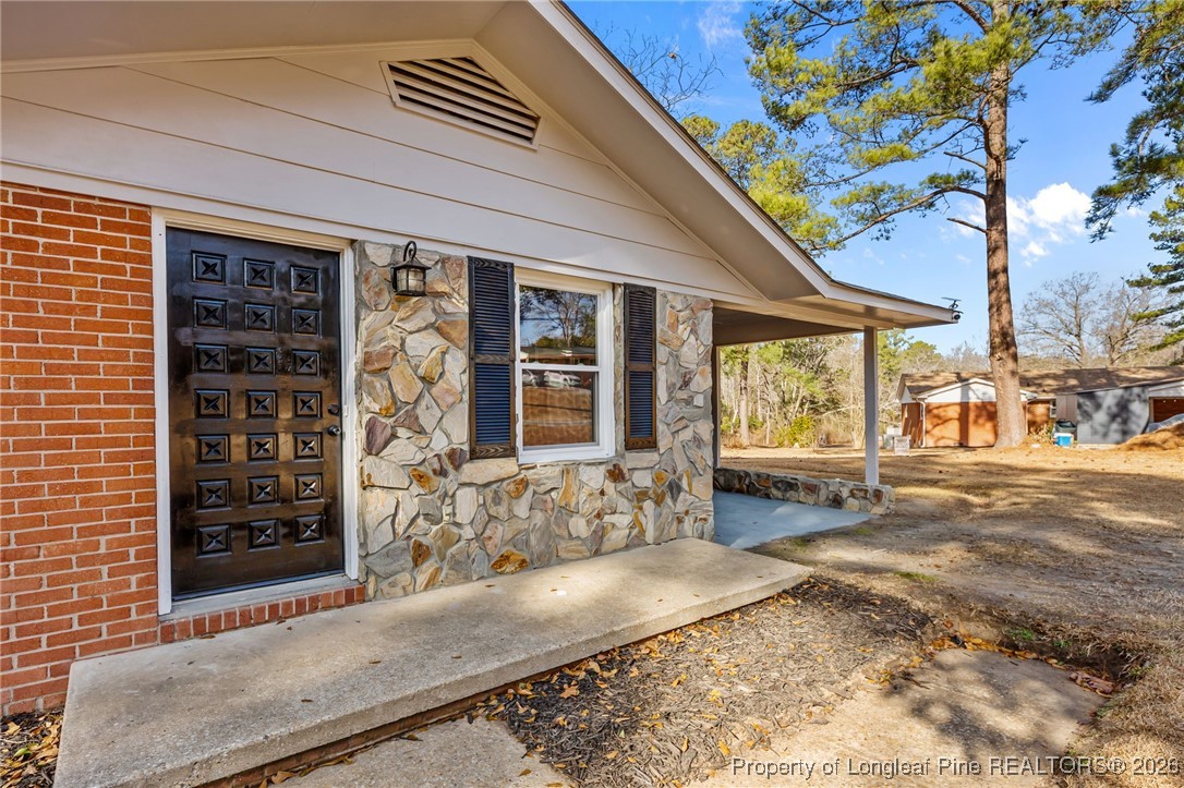 1509 Pope Street Raeford, NC 28376 - Photo 5 of 30 a view of a entryway door front of house