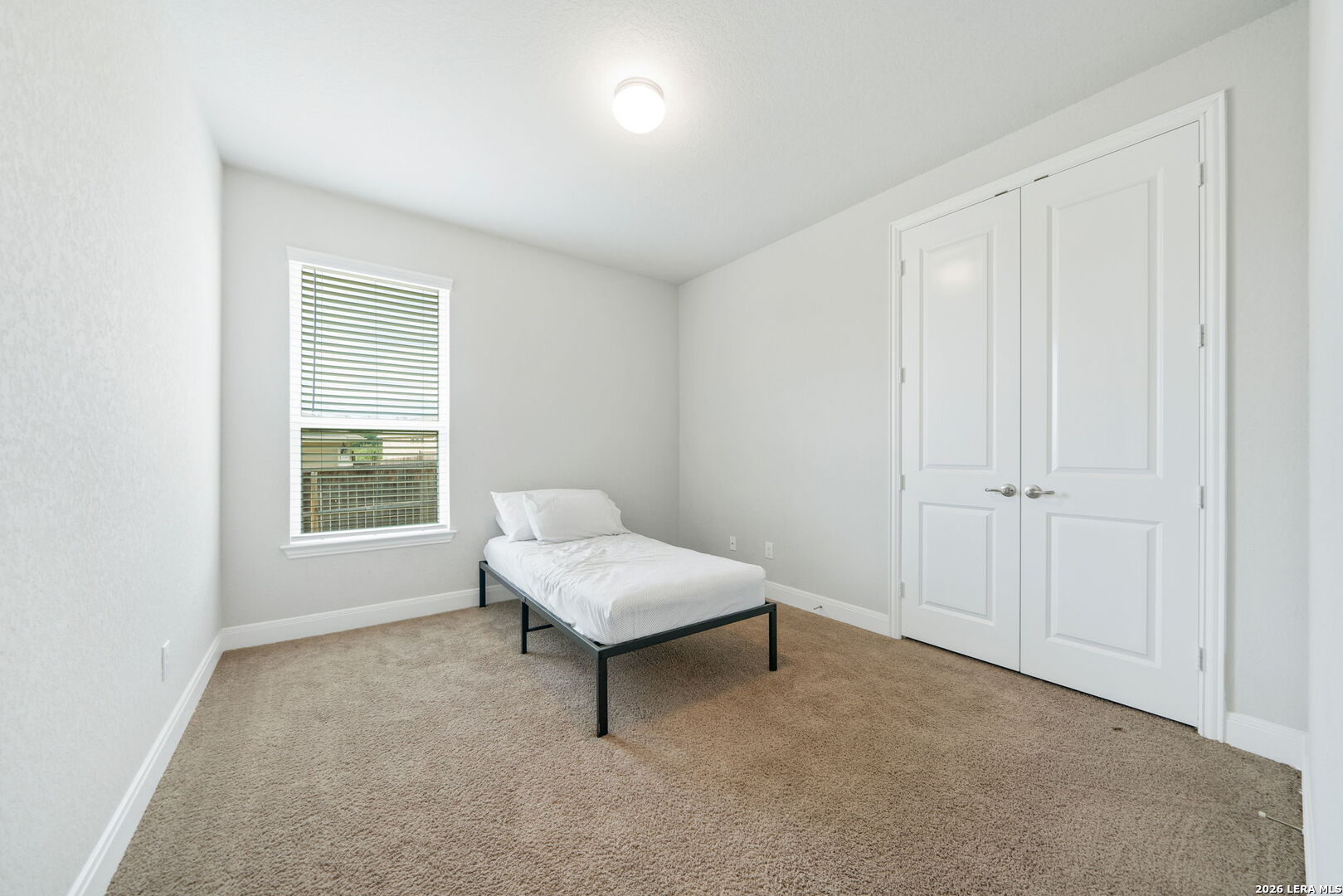 32103 Mirasol Bend Bulverde, TX 78163 - Photo 17 of 23 a living room with furniture and a window