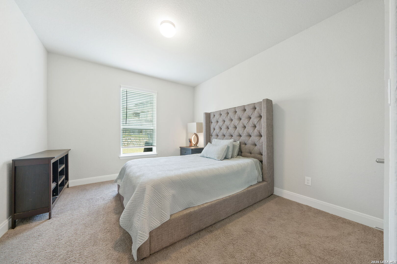 32103 Mirasol Bend Bulverde, TX 78163 - Photo 21 of 23 a bedroom with a bed and furniture