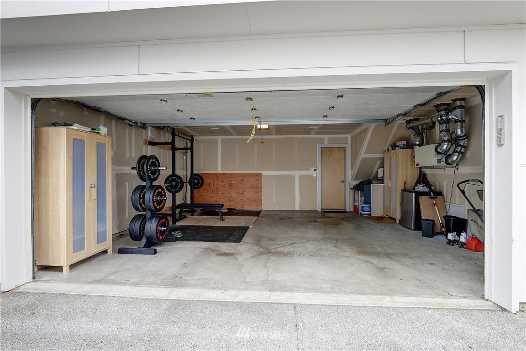 2771 59th Avenue Southwest Seattle, WA 98116 - Photo 16 of 23 a view of a room with gym equipment