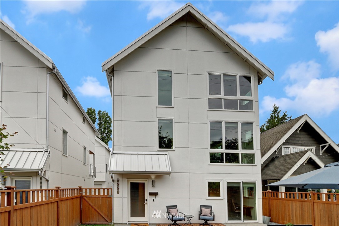 2771 59th Avenue Southwest Seattle, WA 98116 - Photo 17 of 23 a view of a house with a yard