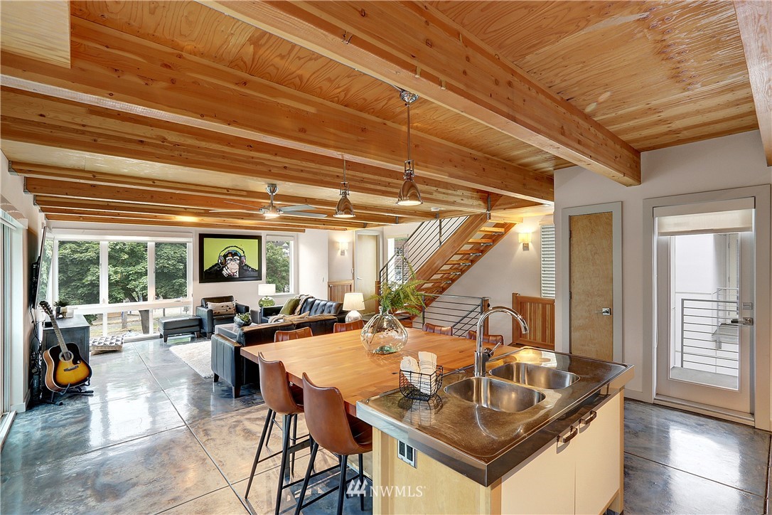 2771 59th Avenue Southwest Seattle, WA 98116 - Photo 5 of 23 a dining room with large window