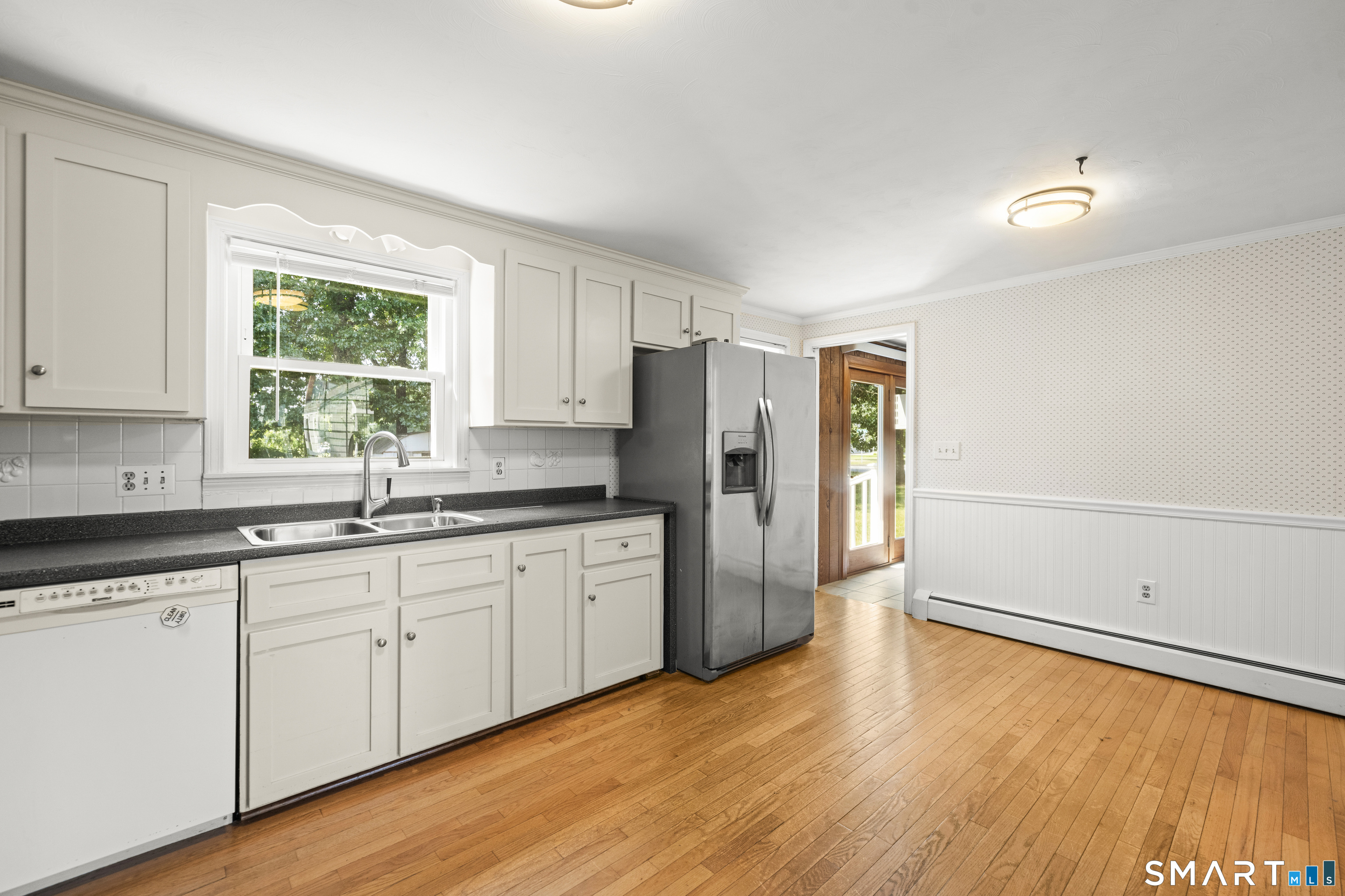 2 Sparkle Street Enfield, CT 06082 - Photo 7 of 32 Remodeled kitchen with wood flooring