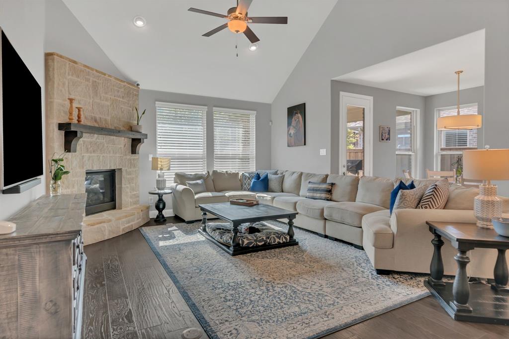 1920 Crescent Street Fort Worth, TX 76008 - Photo 12 of 40 a living room with furniture and a fireplace