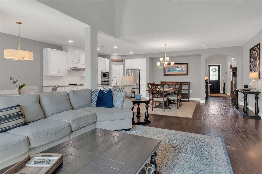 1920 Crescent Street Fort Worth, TX 76008 - Photo 14 of 40 a living room with furniture and wooden floor
