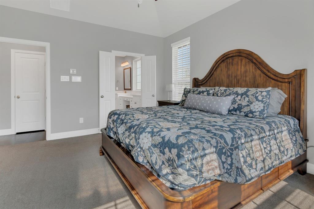 1920 Crescent Street Fort Worth, TX 76008 - Photo 16 of 40 a bedroom with a bed and window