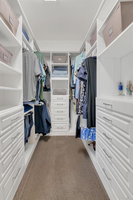 1920 Crescent Street Fort Worth, TX 76008 - Photo 19 of 40 a view of walk in closet with clothes and shoes