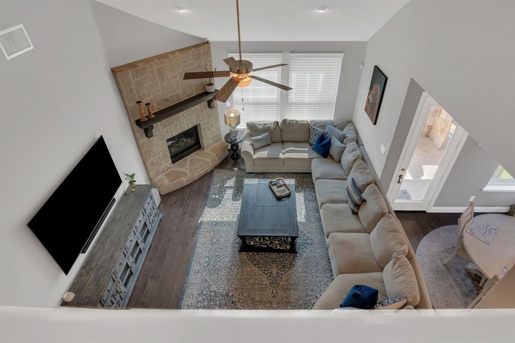 1920 Crescent Street Fort Worth, TX 76008 - Photo 25 of 40 a living room with furniture and a flat screen tv