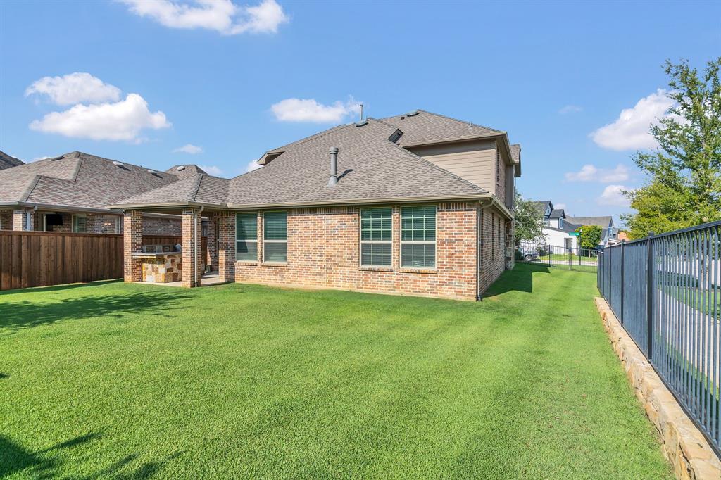 1920 Crescent Street Fort Worth, TX 76008 - Photo 34 of 40 a front view of a house with yard