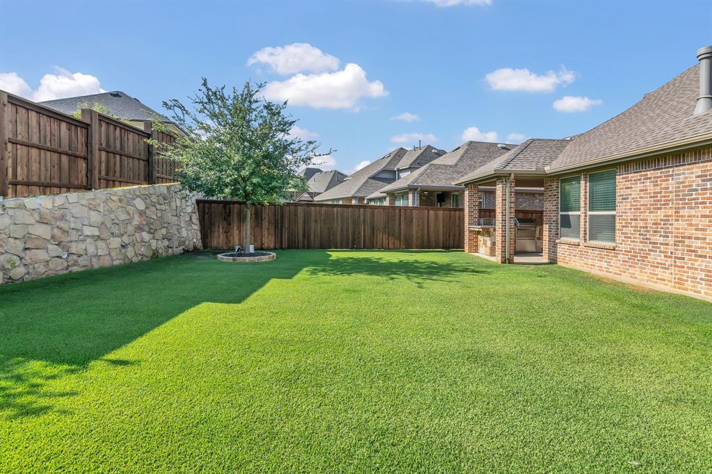 1920 Crescent Street Fort Worth, TX 76008 - Photo 35 of 40 a view of a house with a yard and sitting area