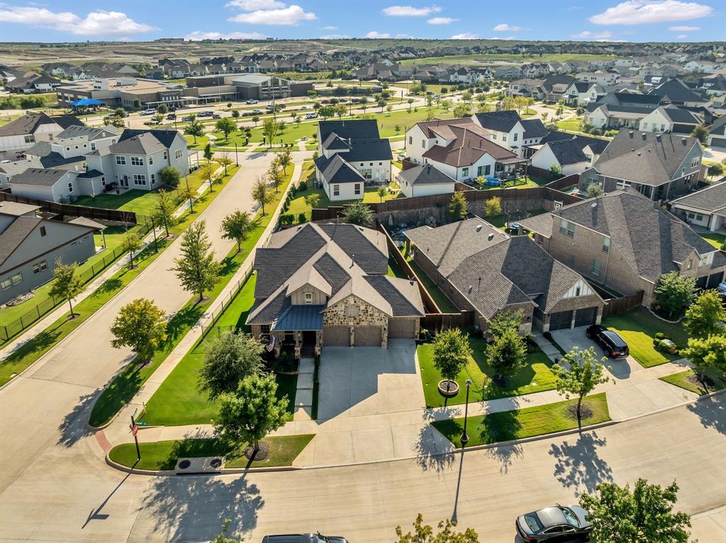 1920 Crescent Street Fort Worth, TX 76008 - Photo 37 of 40 an aerial view of residential houses with outdoor space
