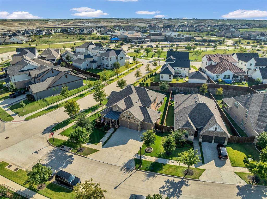 1920 Crescent Street Fort Worth, TX 76008 - Photo 38 of 40 an aerial view of a house with a ocean view