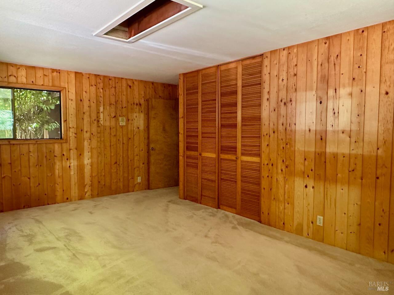 33182 Frog Pond Road Little River, CA 95456 - Photo 7 of 14 a view of an empty room with a window