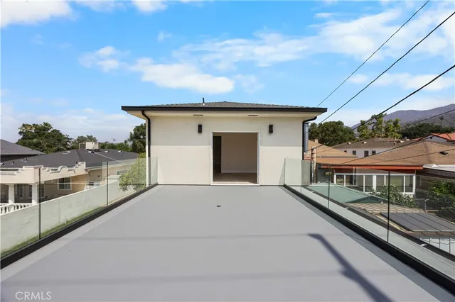 a view of a balcony with city view