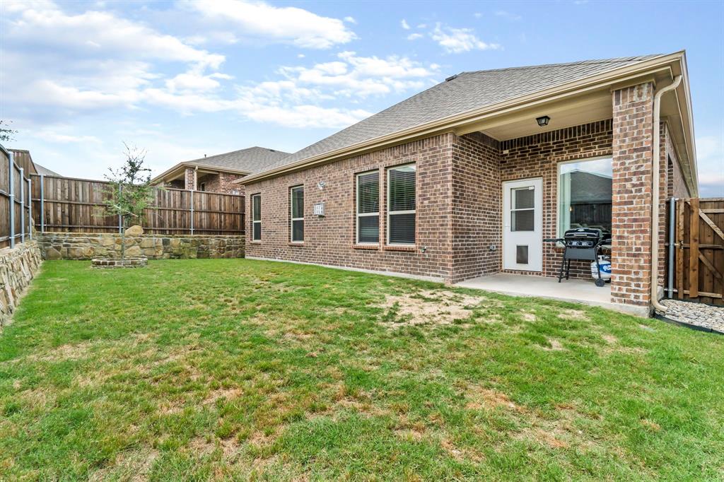 3610 Bastrop Street Melissa, TX 75454 - Photo 21 of 23 front view of a house with a yard
