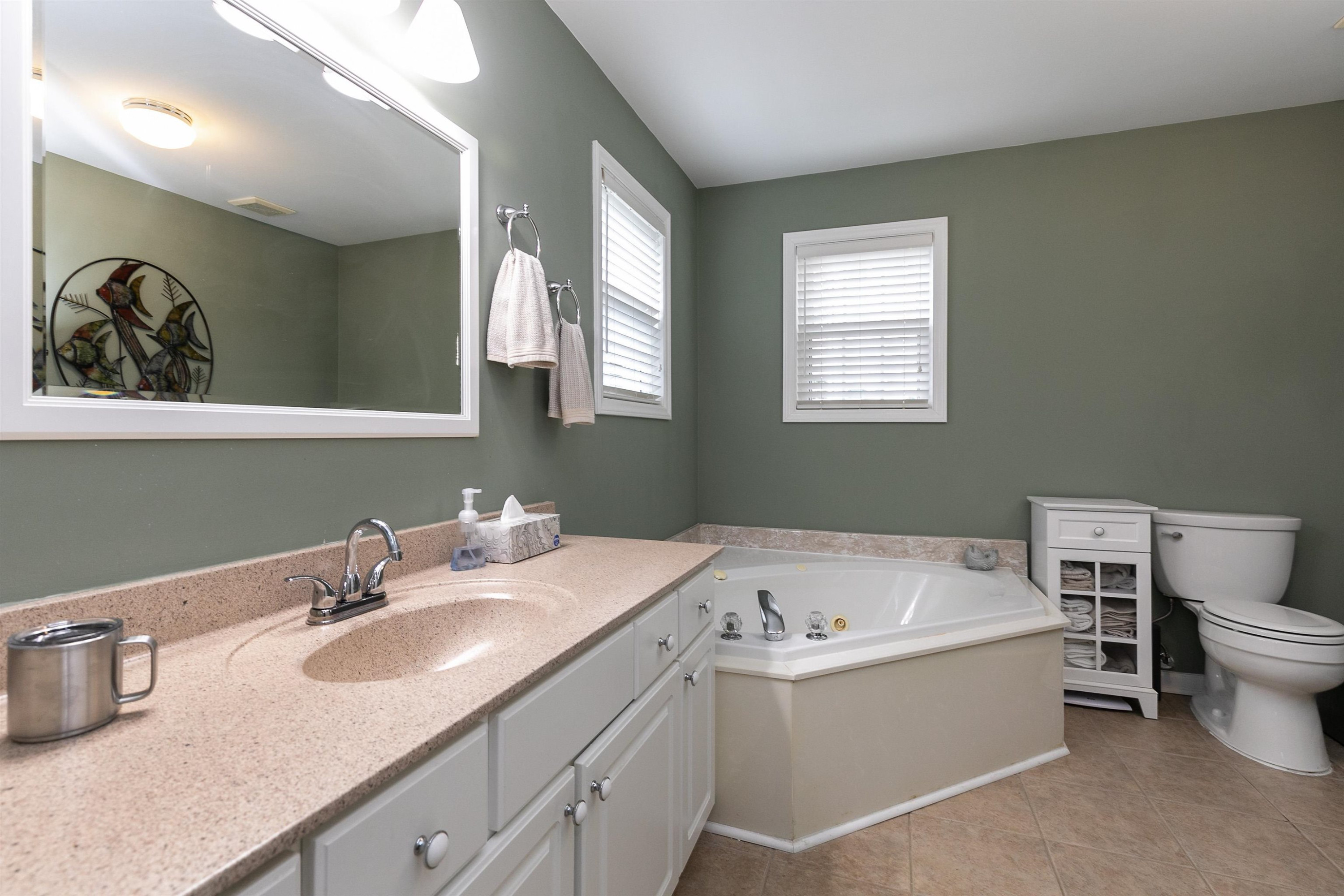 2213 Wellington Ridge Loop Cary, NC 27518 - Photo 11 of 29 Enjoy the size of this master bathroom with oversized vanitiy, separate shower, & jacuzzi.... Master Bathroom
