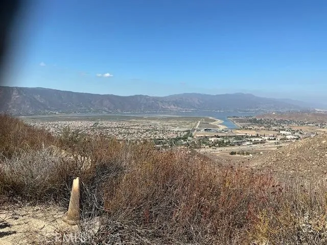 a view of a lake with mountains in the background
