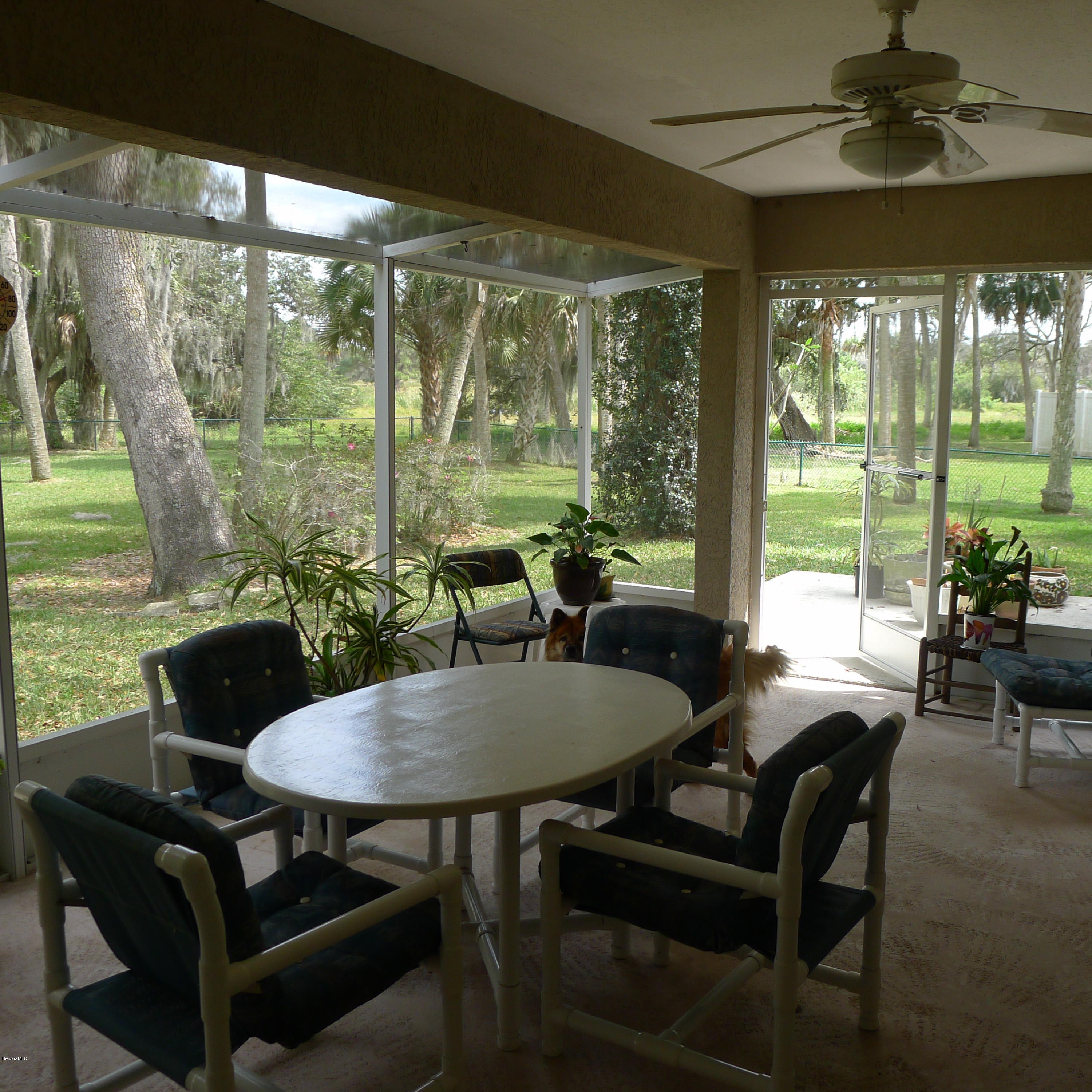 771 Seymour Road Northeast Palm Bay, FL 32905 - Photo 14 of 21 Screened Lanai