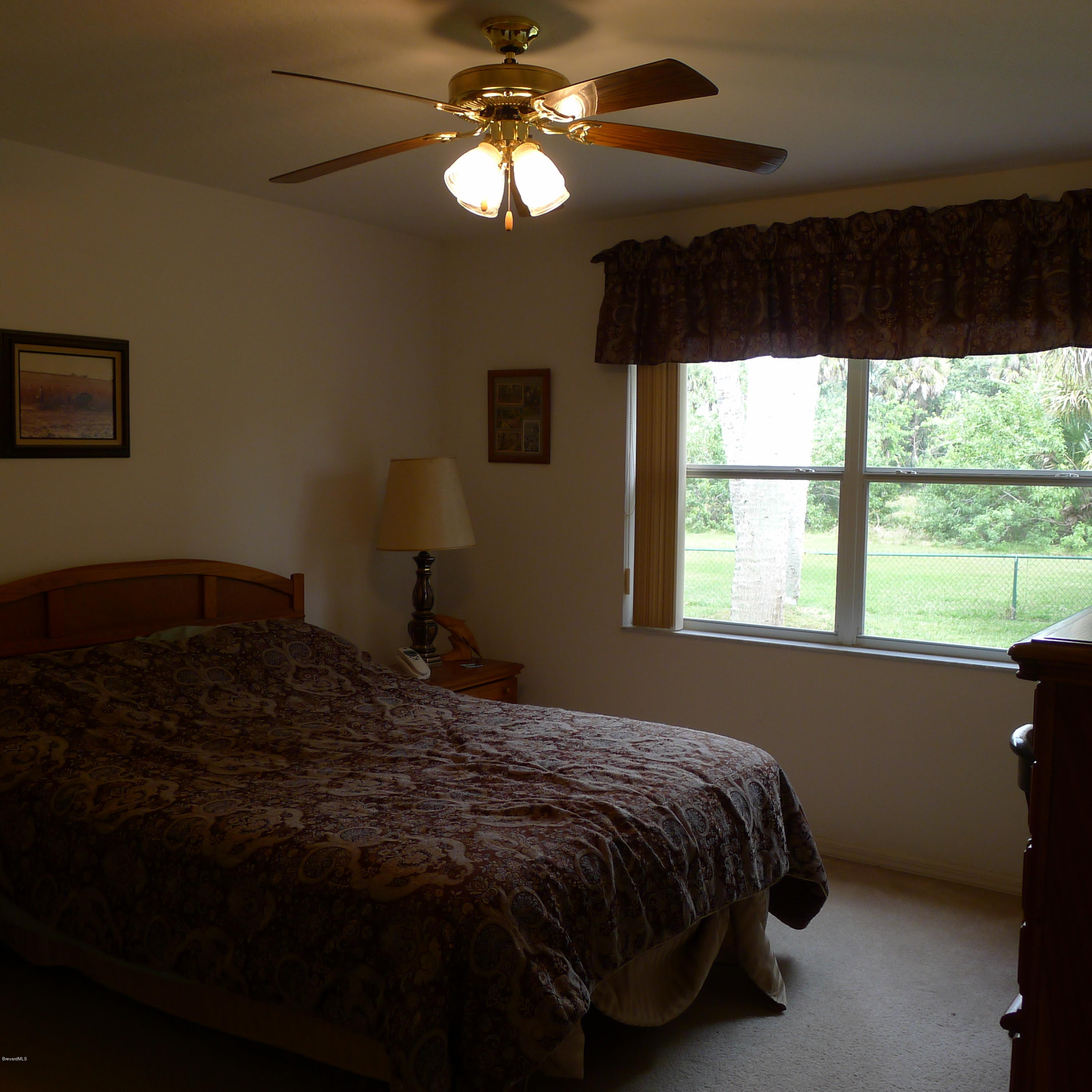 771 Seymour Road Northeast Palm Bay, FL 32905 - Photo 7 of 21 Bedroom 2