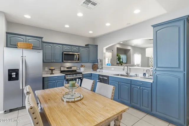 a white bath tub with a potted plant