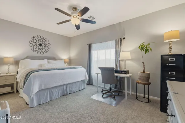 an aerial view of a house with a garden and mountain view