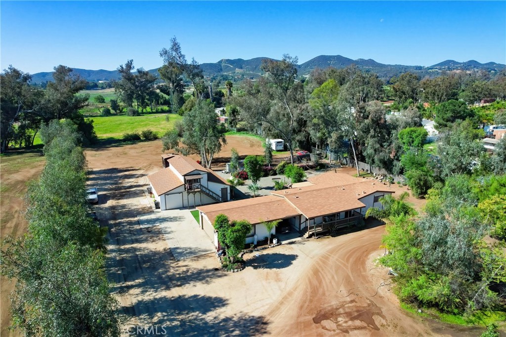 27355 Scott Road Menifee, CA 92584 - Photo 16 of 16 an aerial view of a house with mountain view