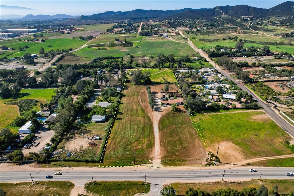 27355 Scott Road Menifee, CA 92584 - Photo 2 of 16 an aerial view of residential houses with outdoor space