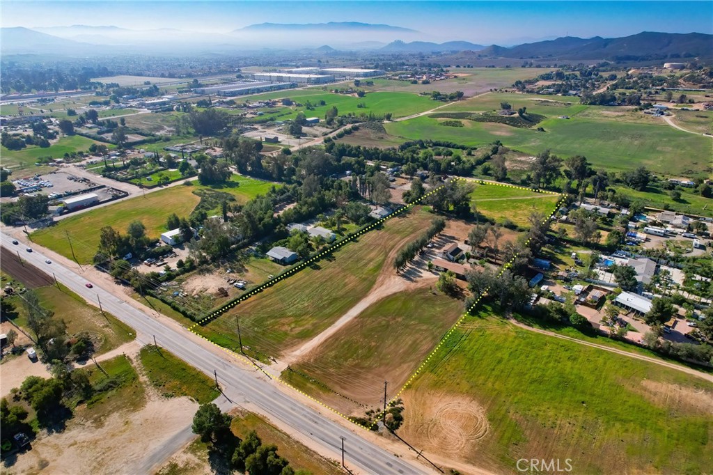 27355 Scott Road Menifee, CA 92584 - Photo 3 of 16 an aerial view of residential houses with outdoor space