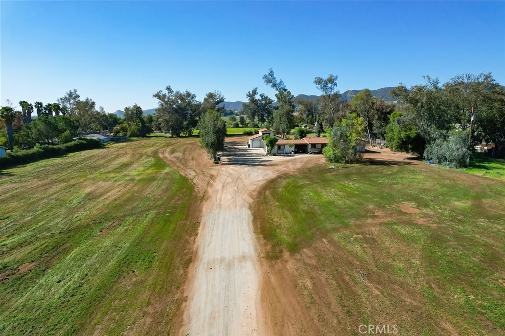 27355 Scott Road Menifee, CA 92584 - Photo 10 of 16 a swimming pool with trees in the background