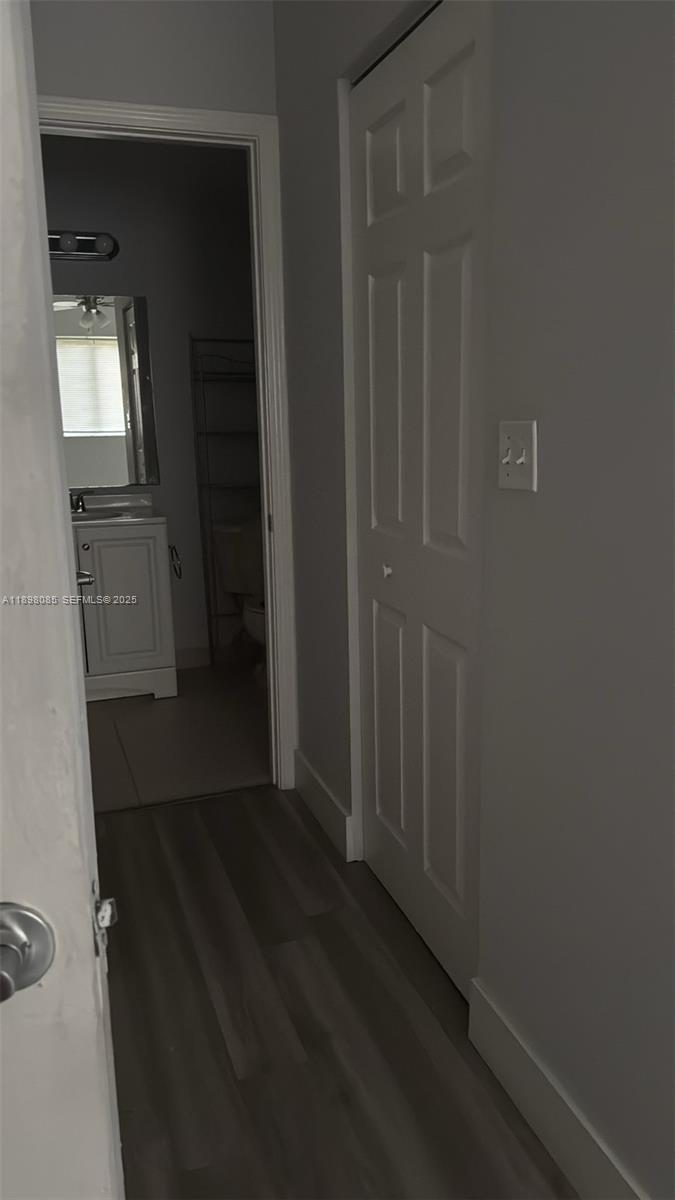 11060 Southwest 196th Street, Unit 103 Cutler Bay, FL 33157 - Photo 5 of 11 a view of a hallway