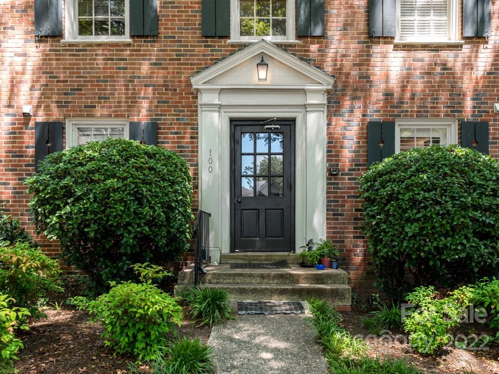 100 Colville Road, Unit 61A Charlotte, NC 28207 - Photo 2 of 15 a view of front of a house with potted plants