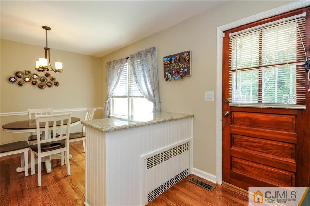 988 Clark Road North Brunswick, NJ 08902 - Photo 8 of 25 a view of a livingroom with furniture window and wooden floor