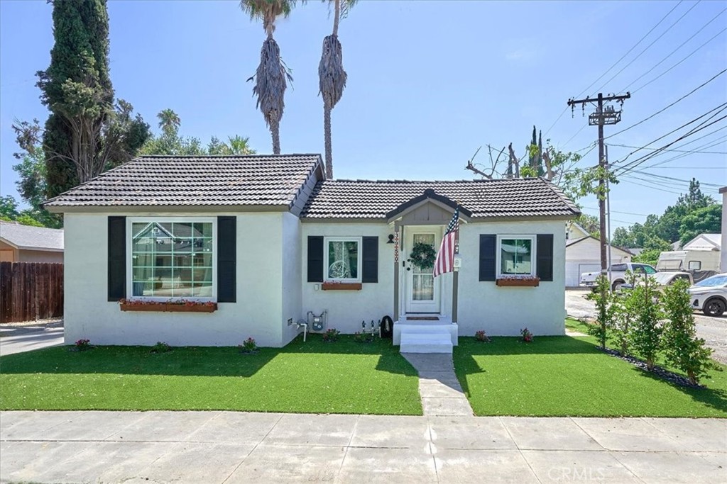 3950 Cedar Street Riverside, CA 92501 - Photo 1 of 1 a front view of house with yard