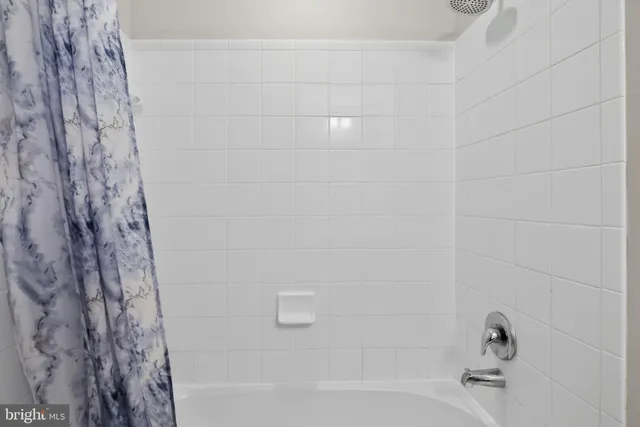 a bathroom with a bathtub